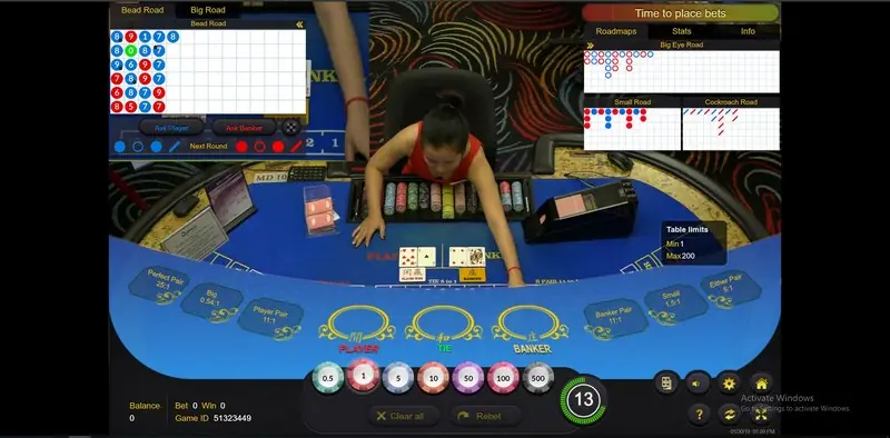 Queenco table view with the betting area and card layout
